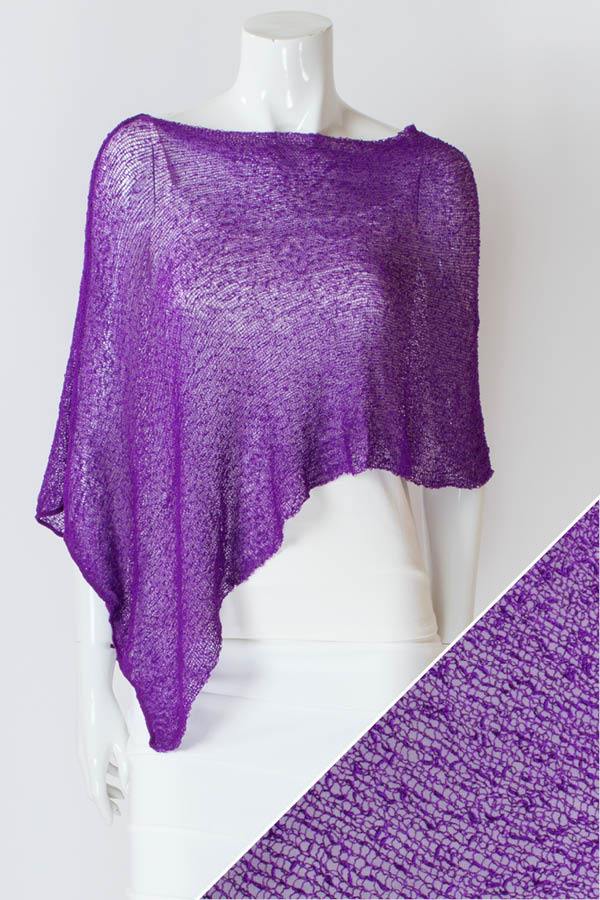 Women's short lightweight 3/4 sleeve sheer poncho shrug.