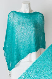 Women's short lightweight 3/4 sleeve sheer poncho shrug.
