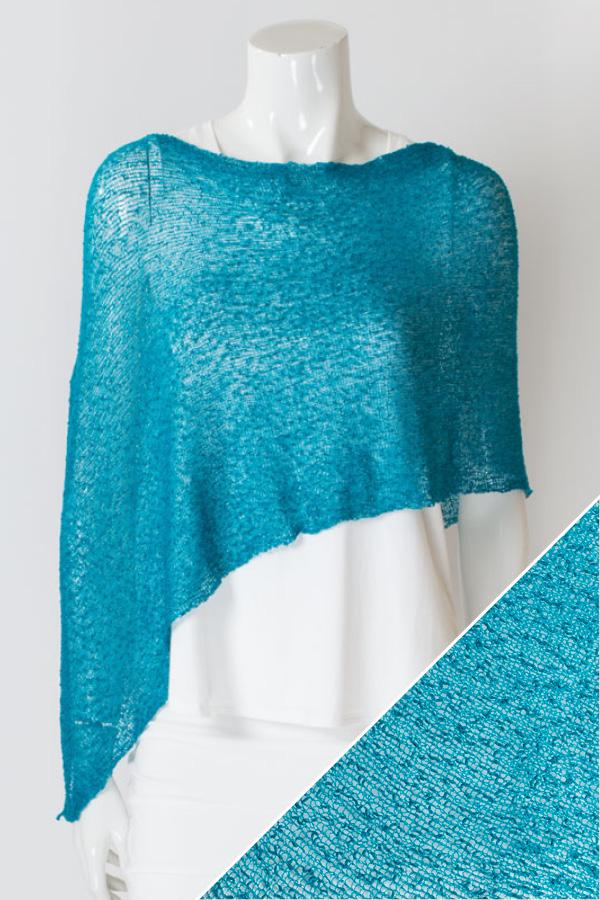 Women's short lightweight 3/4 sleeve sheer poncho shrug.