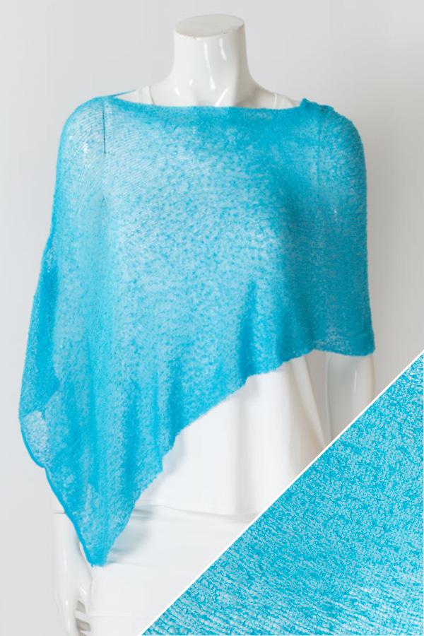 Women's short lightweight 3/4 sleeve sheer poncho shrug.