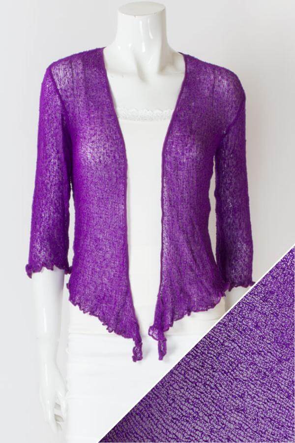 Women's short lightweight 3/4 sleeve sheer shrug.