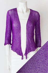 Women's short lightweight 3/4 sleeve sheer shrug.