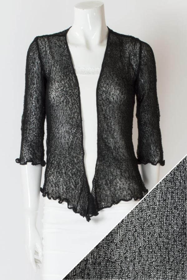 Women's short lightweight 3/4 sleeve sheer shrug.