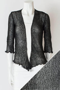 Women's short lightweight 3/4 sleeve sheer shrug.
