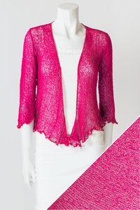 Women's short lightweight 3/4 sleeve sheer shrug.