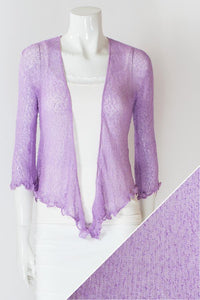 Women's short lightweight 3/4 sleeve sheer shrug.
