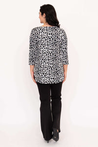 Back view of model wearing Jazz 3/4 sleeve bamboo leopard print top