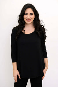 Woman wearing a black 3/4 sleeve bamboo top, front view, smiling