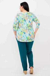 Back view of woman showcasing a light blue floral V-neck top with 3/4 sleeves