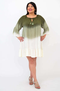 Model standing in Ellie Dress, highlighting knee length and ombre color gradient