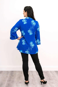 Back view of blue blouse with light blue floral print and mandarin collar