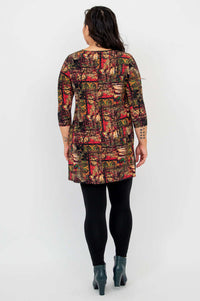 Back view of model wearing Perfect Print tunic, showing 3/4 sleeves and colorful design