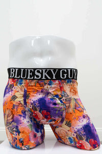 Angled front view of men's floral boxer briefs with supportive pouch and branded waistband
