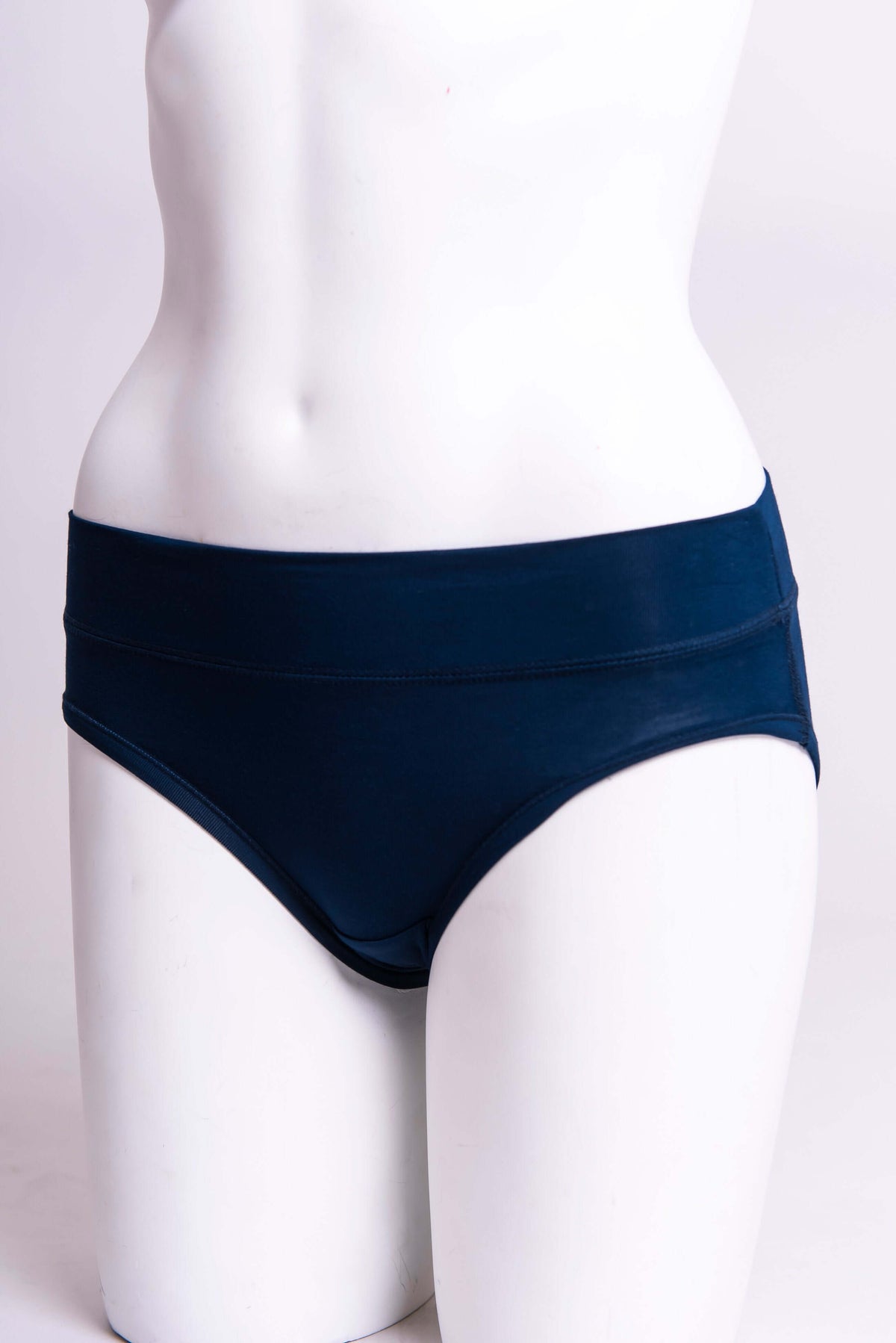Angled front view of navy blue hipster brief underwear on mannequin