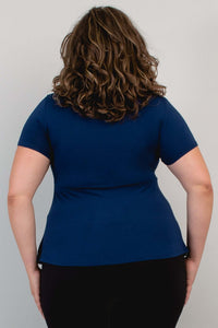 Back close-up of model wearing Kim Cap Top in navy