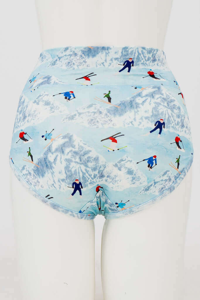 Back view showing seamless design and all-over skier print