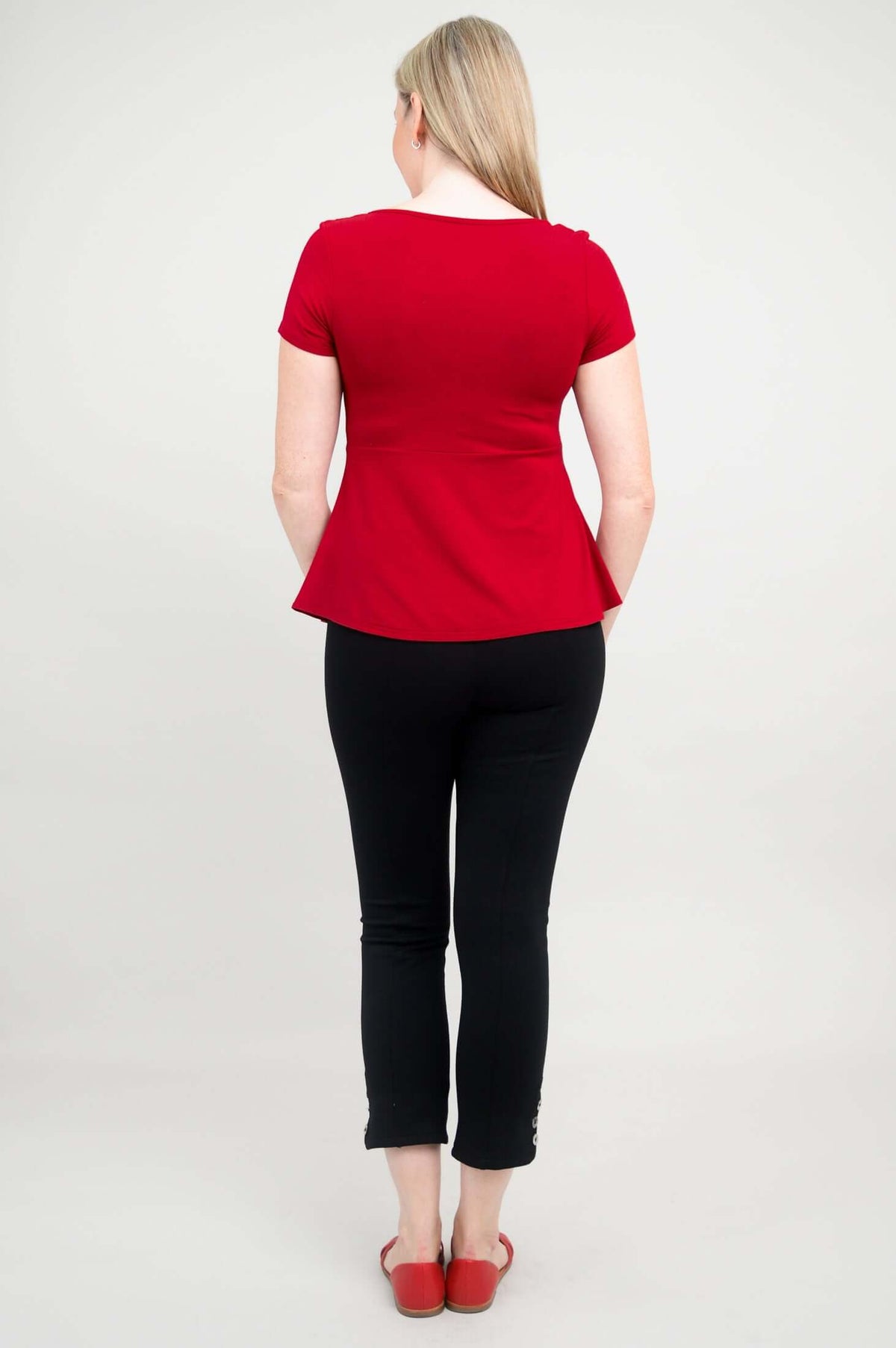 Back view of woman wearing Kim Cap bamboo top in cherry red