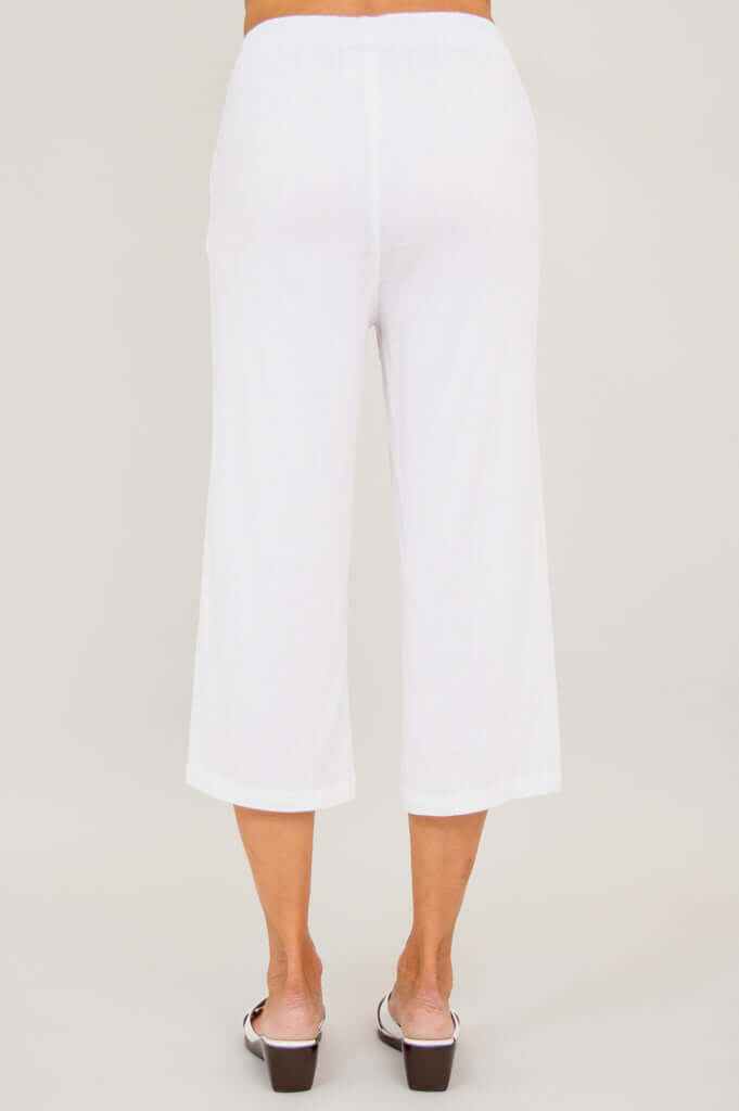 Back view of Bella Capri Pant in white, featuring elastic waistband and straight leg