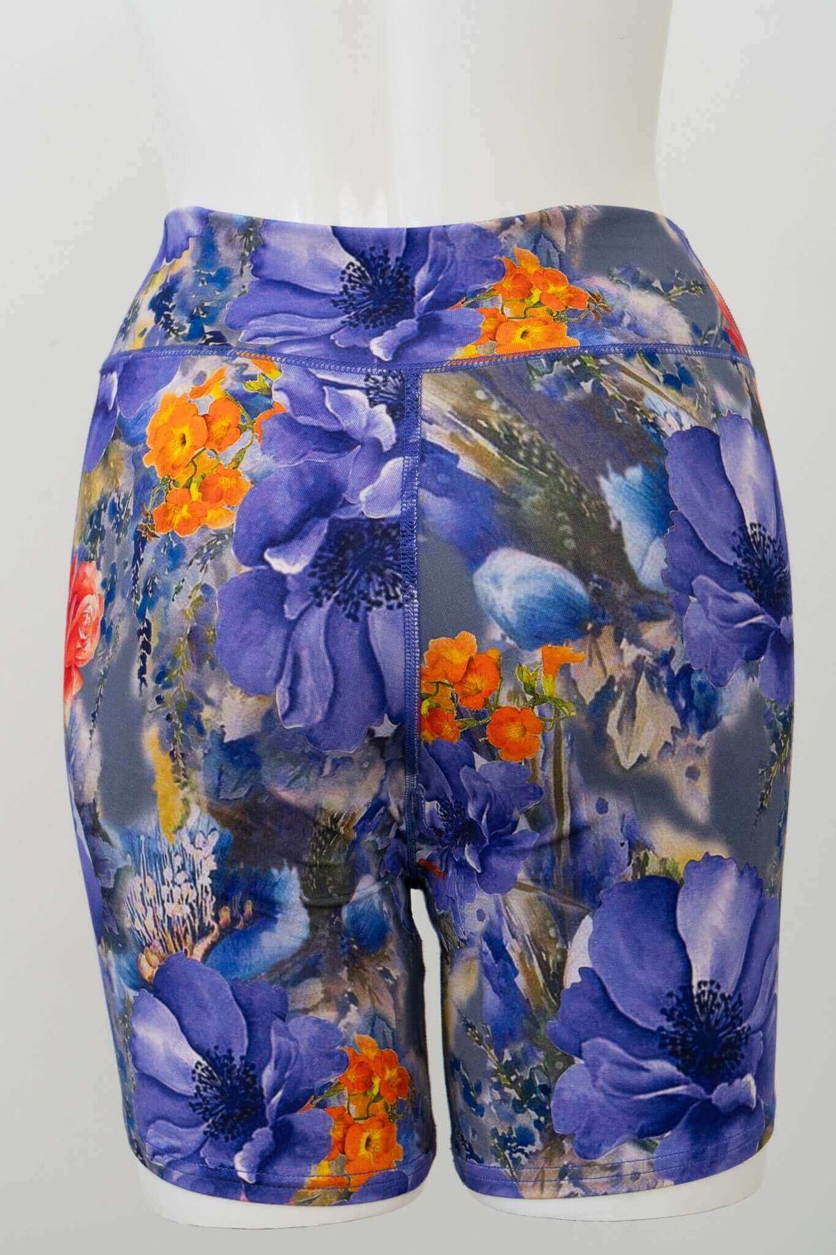 Back view of Hallie Bamboo Shorts with striking blue, orange, and red flower patterns