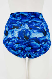 Back view of La Gaunche classic brief in blue abstract print on mannequin