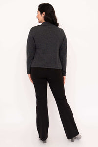 Back view of model in charcoal gray cardigan and black pants