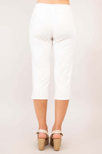Back view of white Susan Capri pants highlighting the elastic waist and fit