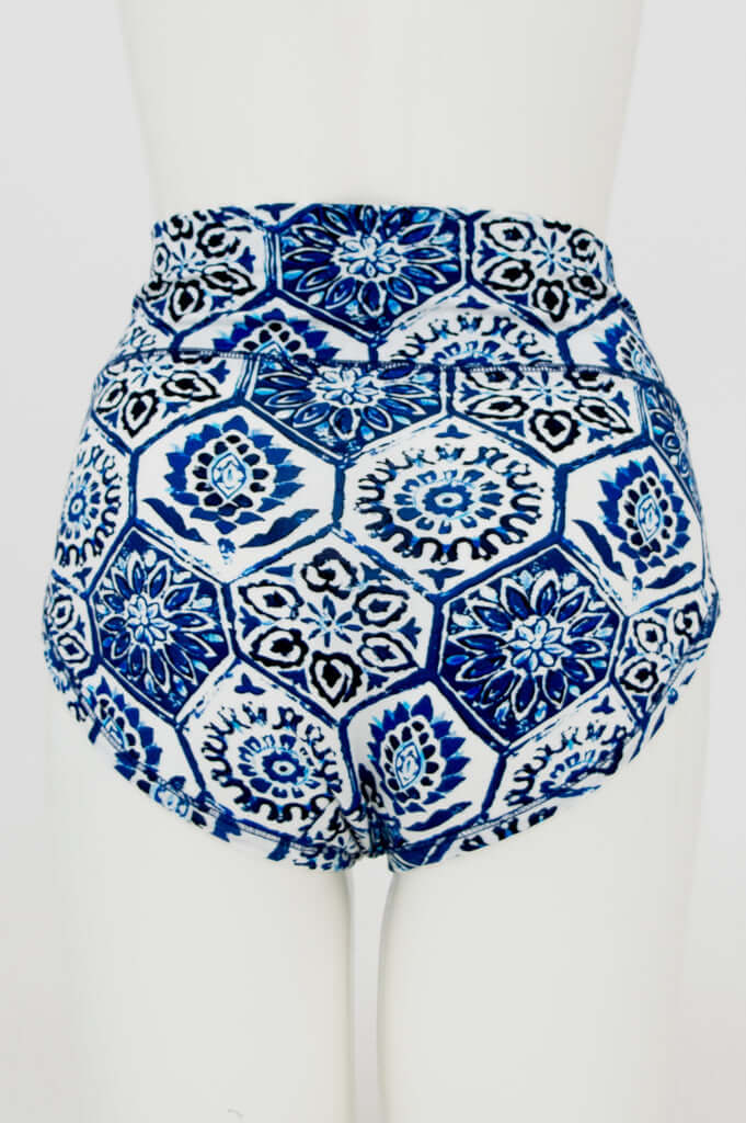 Back view of blue mosaic patterned high-waist brief on mannequin