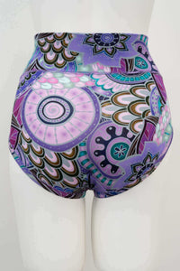 Back view of high-waisted brief featuring bold mandala print in purple, teal, and pink