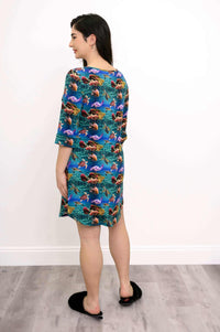 Woman showing back view of ocean print bamboo sleepshirt