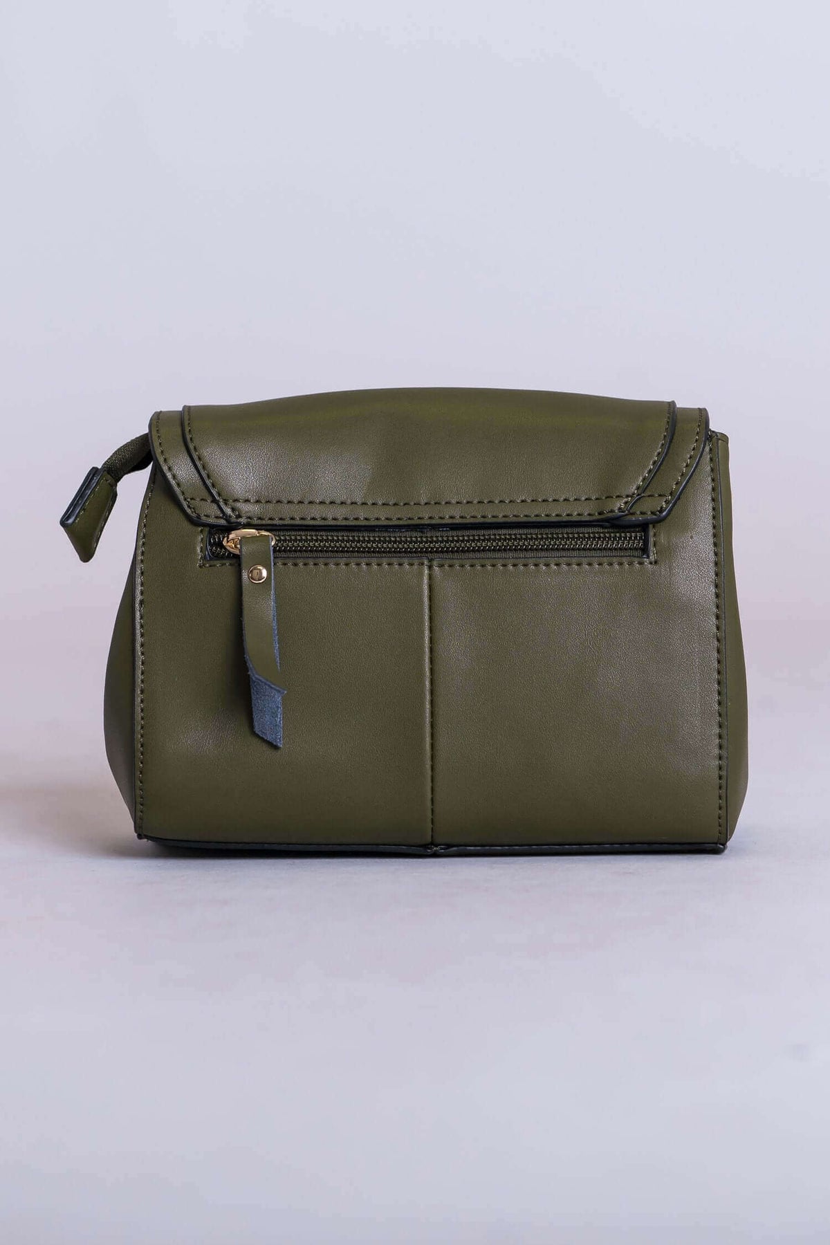 Back view of olive Muse bag showing zipper pocket and adjustable strap
