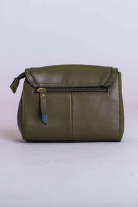 Back view of olive Muse bag showing zipper pocket and adjustable strap