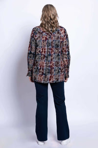 Back view of a woman wearing a long sleeve multi plaid cotton jacket displaying clean shoulder fit.
