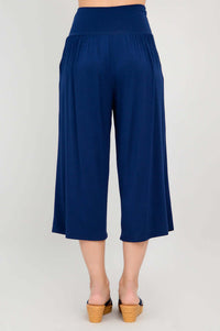 Back view of royal blue gaylene bamboo capri pants showing waistband and length