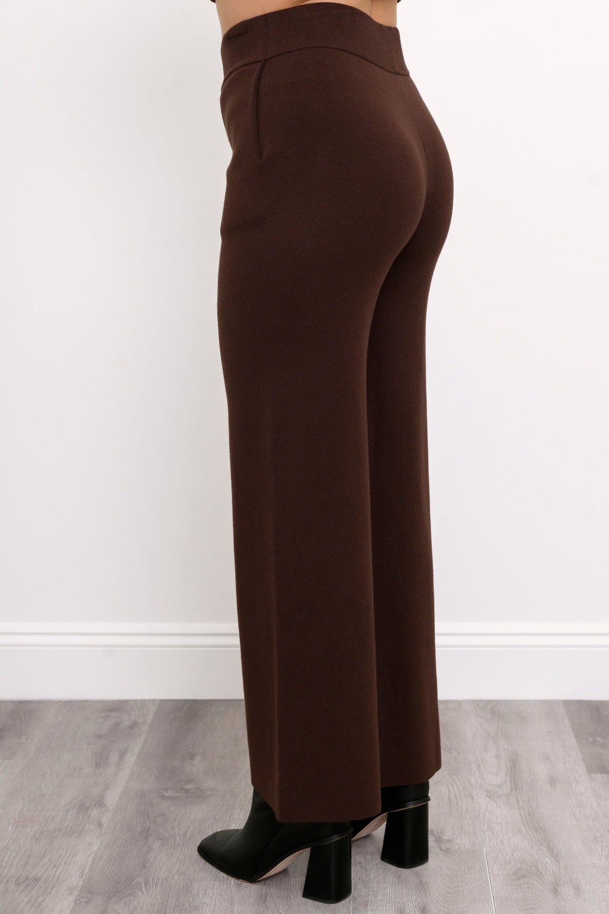 Back view of women's deep cocoa pull-on pants, illustrating a clean, relaxed-fit straight-leg silhouette.