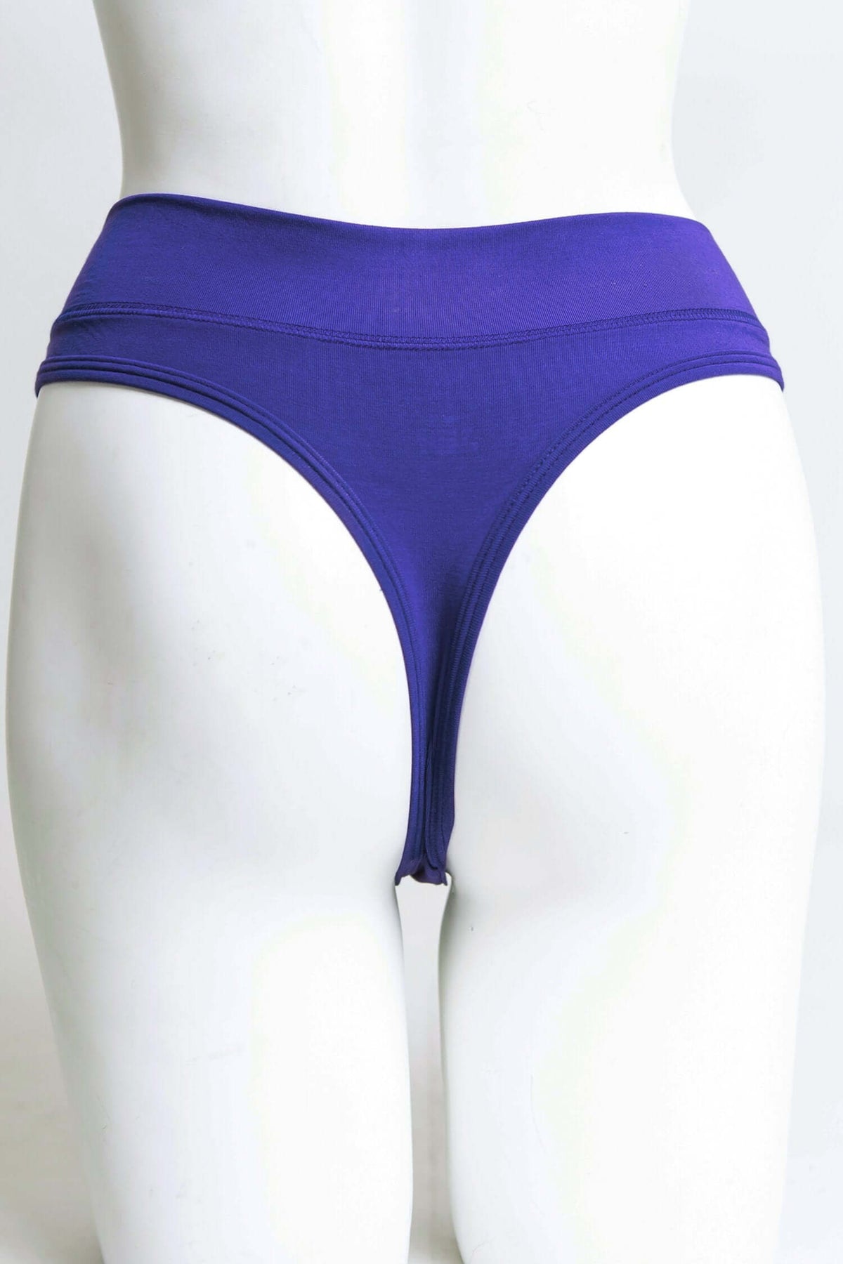 Back view of high rise thong underwear in violet on mannequin