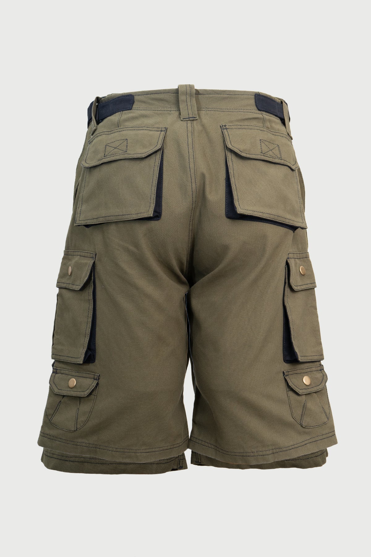 Heavy duty green cotton utility shorts shown from behind with multiple tactical flap pockets and belt loops