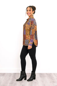 Profile shot of a relaxed-fit linen bamboo blend shirt featuring a colorful geometric and floral patchwork pattern
