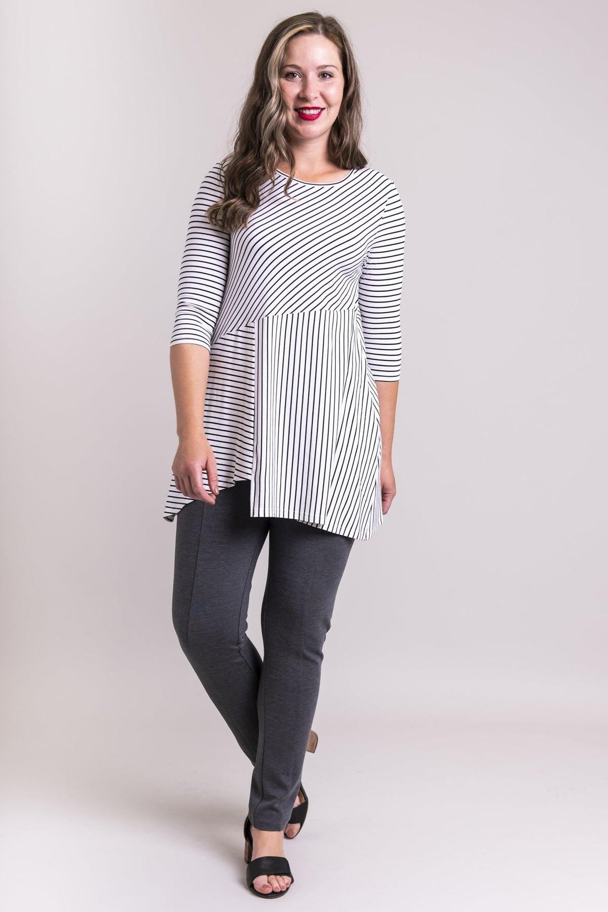 Women's black and white plus-size striped 3/4 sleeve tunic dress. Made with sustainable and fair-trade natural fibers.