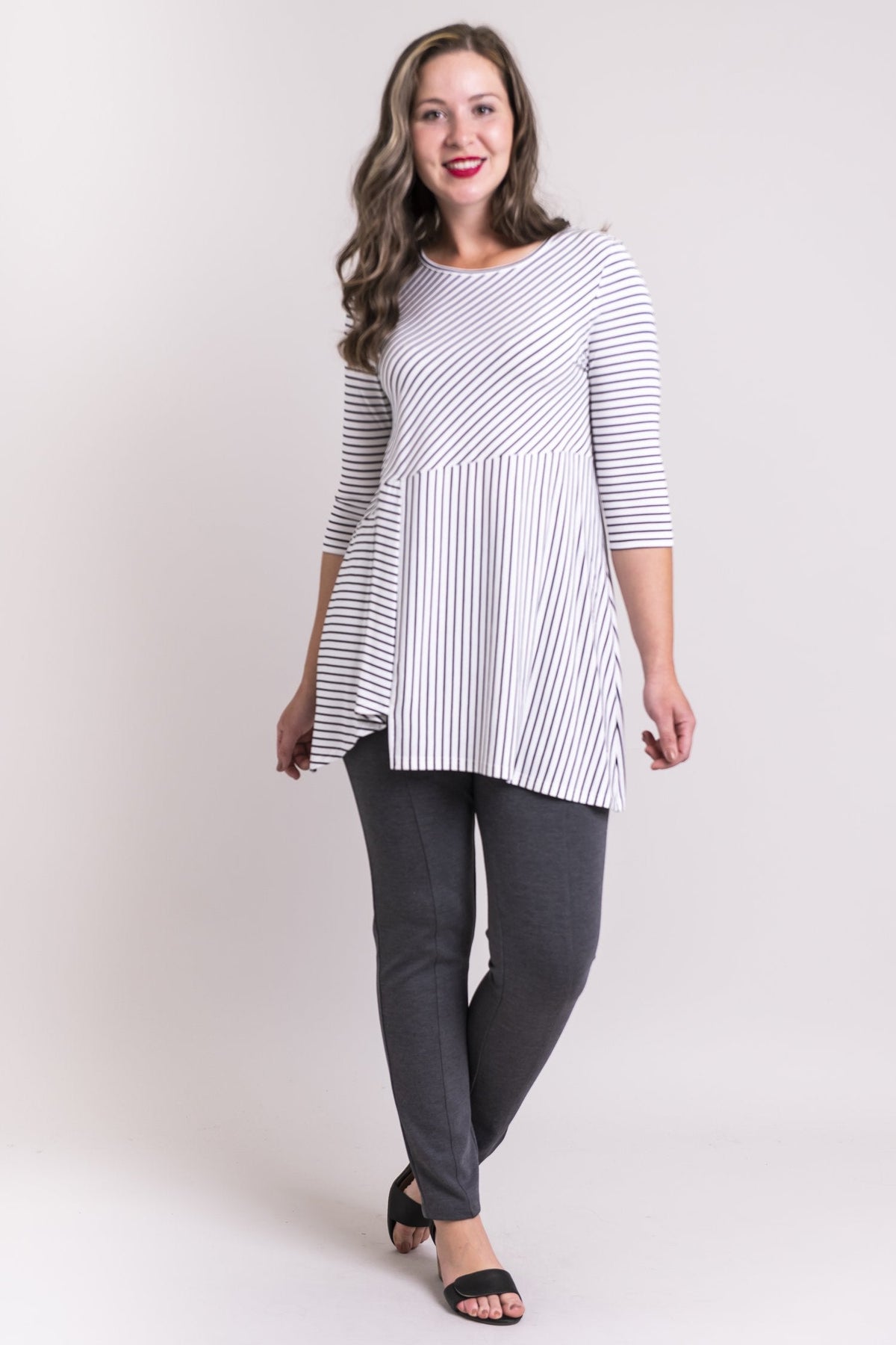Women's black and white plus-size striped 3/4 sleeve tunic dress. Made with sustainable and fair-trade natural fibers.