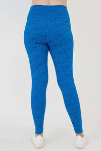 Model wearing cobalt blue Riley leggings, back view