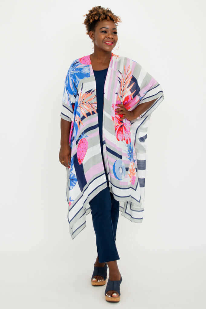 Model smiling in Darcy floral kimono wrap angled view