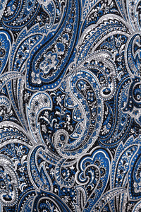 Close-up detail of blue and white paisley pattern fabric