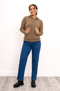 Full body front view of woman in a teddy bear brown cashmere hoodie with straight leg jeans