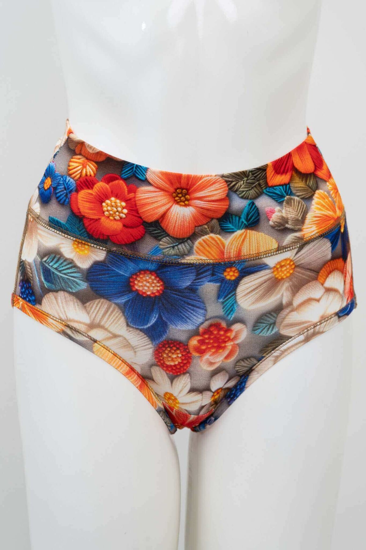 Front view of high waist brief with colorful floral print on mannequin