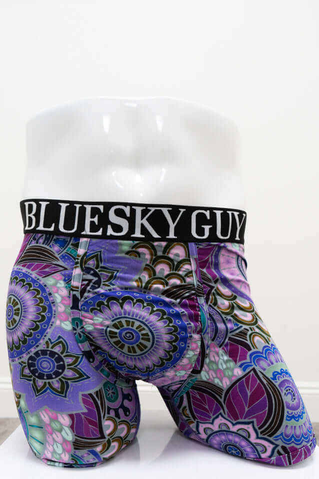Front view of Middle Man bamboo boxer briefs with vibrant purple and blue floral pattern