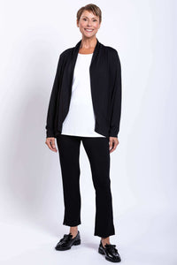 Front view of woman in black French Terry jacket with white shirt and black pants