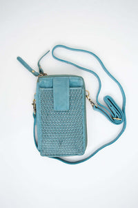 Front view of an azure woven leather crossbody wallet with strap