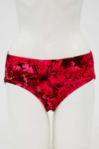 Front view of women's low-rise hipster underwear in crimson abstract print on mannequin