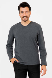 Man wearing charcoal grey V-neck long sleeve shirt, front view