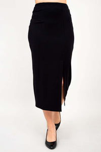 Front view of Eva long black slim skirt with a side slit